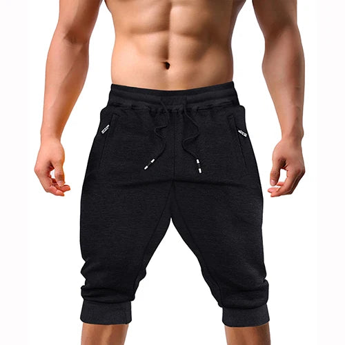 Renzo™ | Herre sweatshorts i bomuldsblanding | Sporty knælange shorts med lynlåslommer, snøre og ribkant