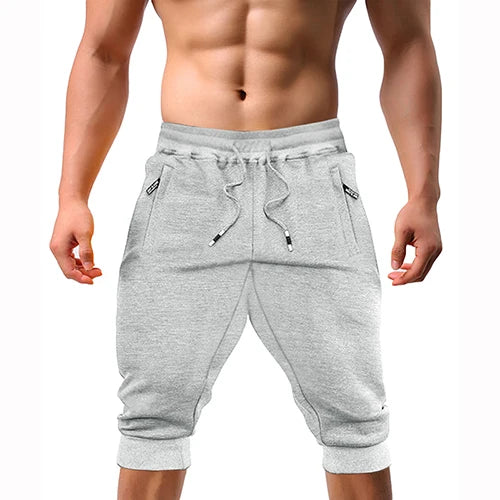 Renzo™ | Herre sweatshorts i bomuldsblanding | Sporty knælange shorts med lynlåslommer, snøre og ribkant