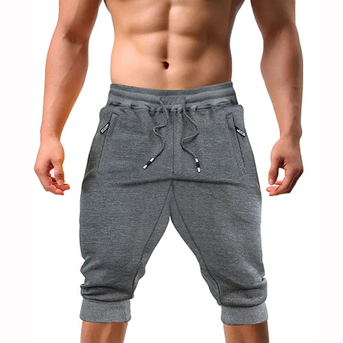 Renzo™ | Herre sweatshorts i bomuldsblanding | Sporty knælange shorts med lynlåslommer, snøre og ribkant
