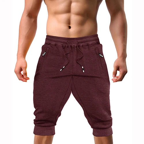 Renzo™ | Herre sweatshorts i bomuldsblanding | Sporty knælange shorts med lynlåslommer, snøre og ribkant