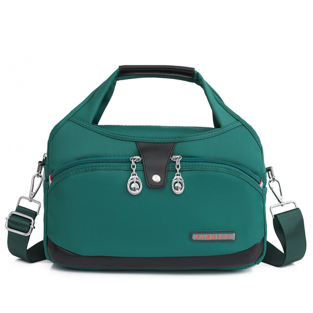 Flexura™ | Vandafvisende Nylon Skuldertaske Med Flere Rum Og Justerbar Rem