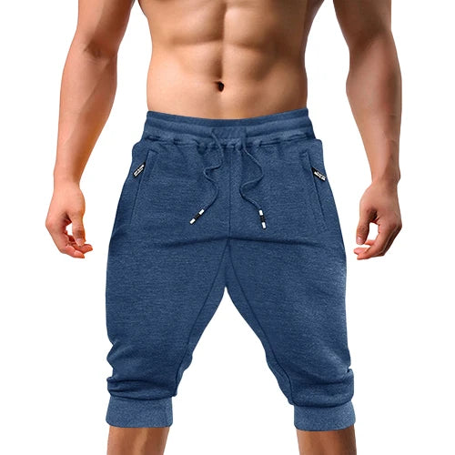 Renzo™ | Herre sweatshorts i bomuldsblanding | Sporty knælange shorts med lynlåslommer, snøre og ribkant