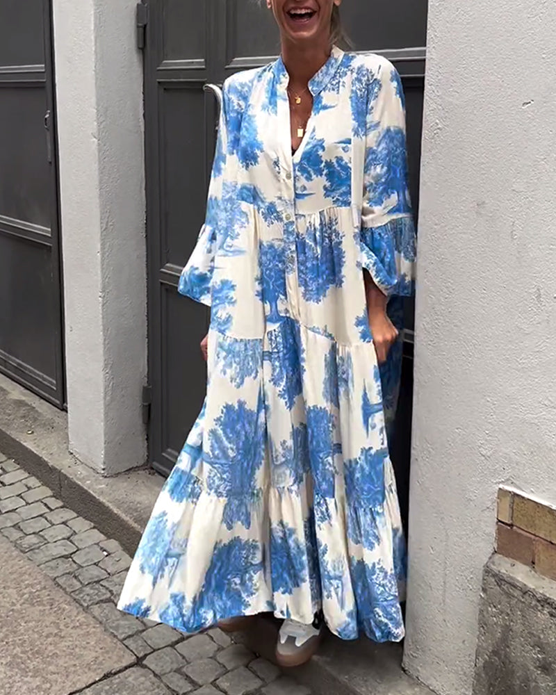 Eliana™ | Lang Kjole med V-hals, Klokkeærmer og Blomsterprint