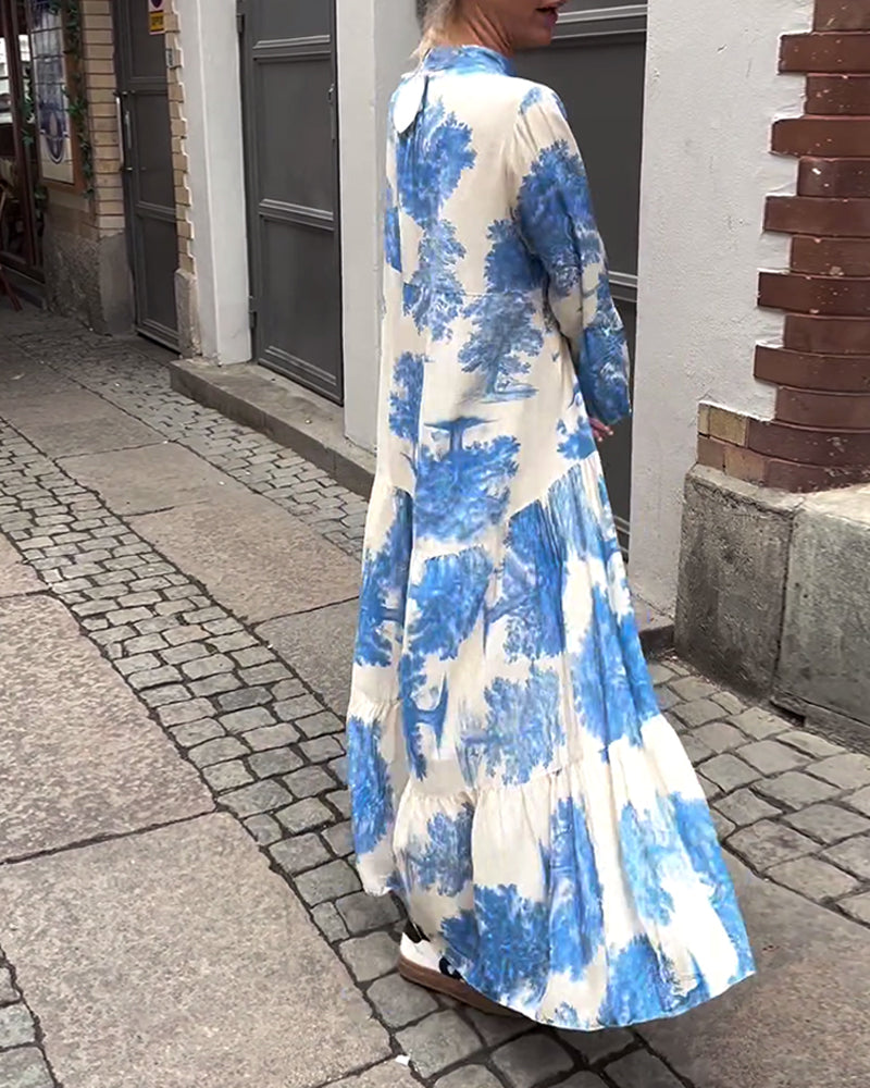 Eliana™ | Lang Kjole med V-hals, Klokkeærmer og Blomsterprint