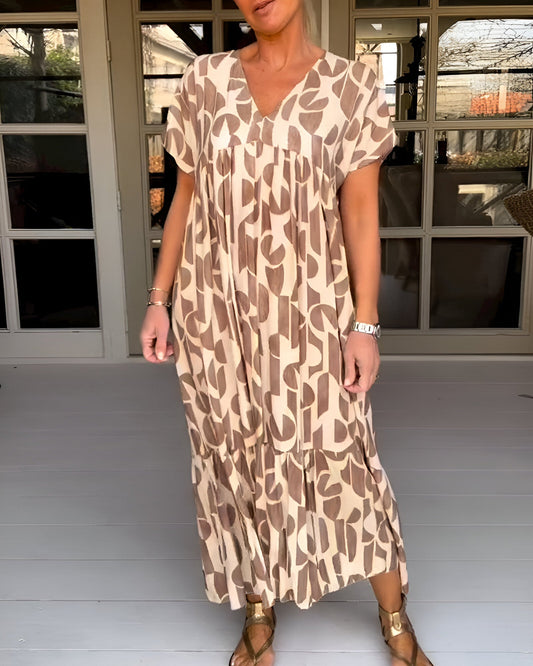 Isalina™ | Damer Maxi-Kjole med Print | Løstsiddende Sommerkjole i Let Materiale med V-Hals og Plisseret Talje