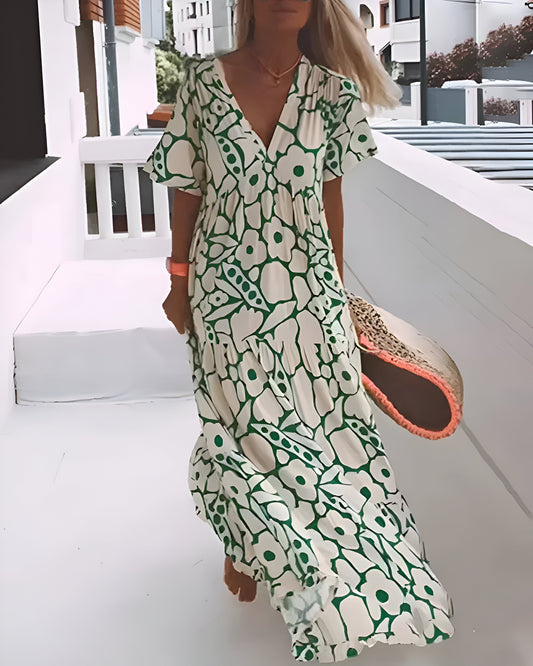 Florivana™ | Damer Maxi Kjole med Blomstermønster | Luftig Sommerkjole med V-Hals, Sommerfugleærmer og Svajende Pasform