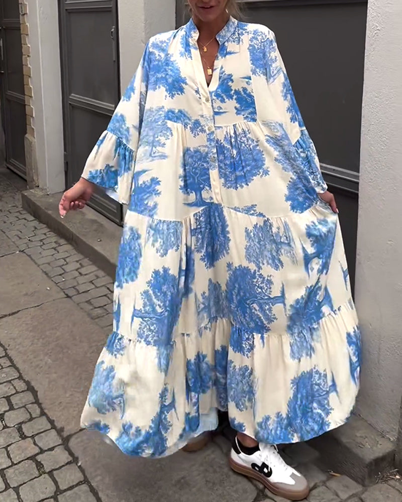Eliana™ | Lang Kjole med V-hals, Klokkeærmer og Blomsterprint