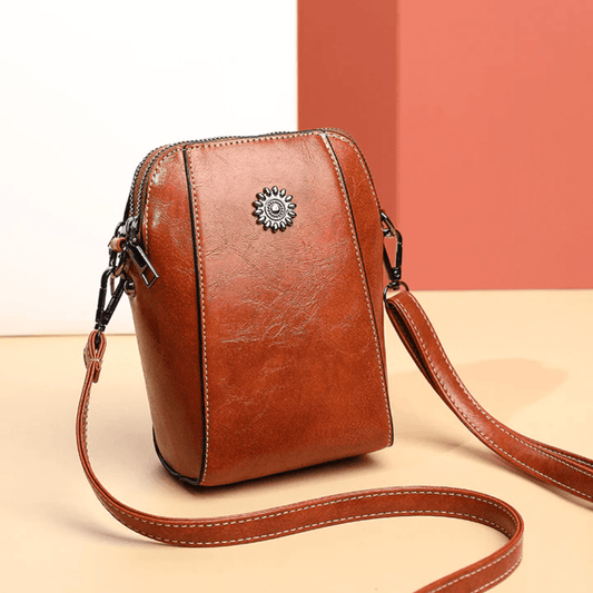 Eloria | Kompakt Crossbodytaske Med Blomsterdetalje