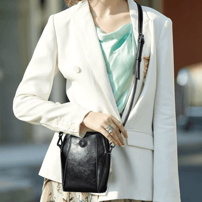 Eloria | Kompakt Crossbodytaske Med Blomsterdetalje
