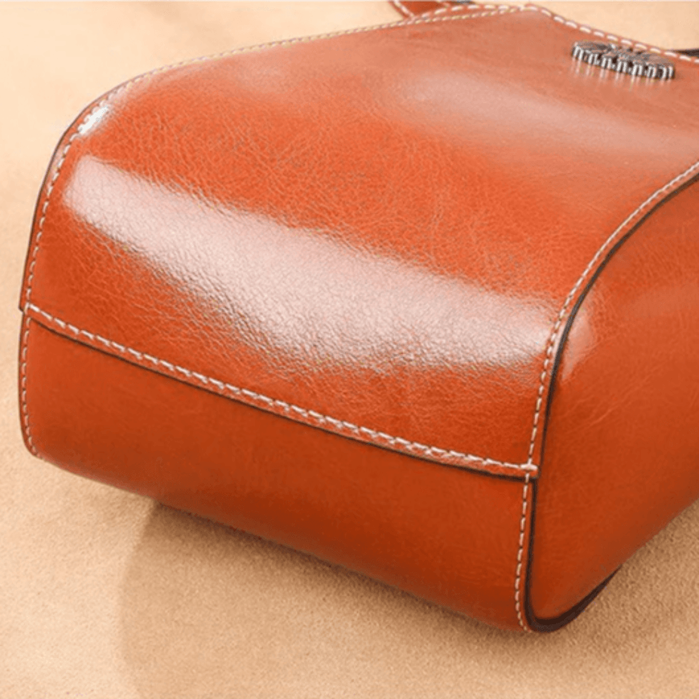 Eloria | Kompakt Crossbodytaske Med Blomsterdetalje