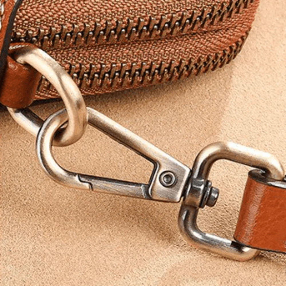 Eloria | Kompakt Crossbodytaske Med Blomsterdetalje