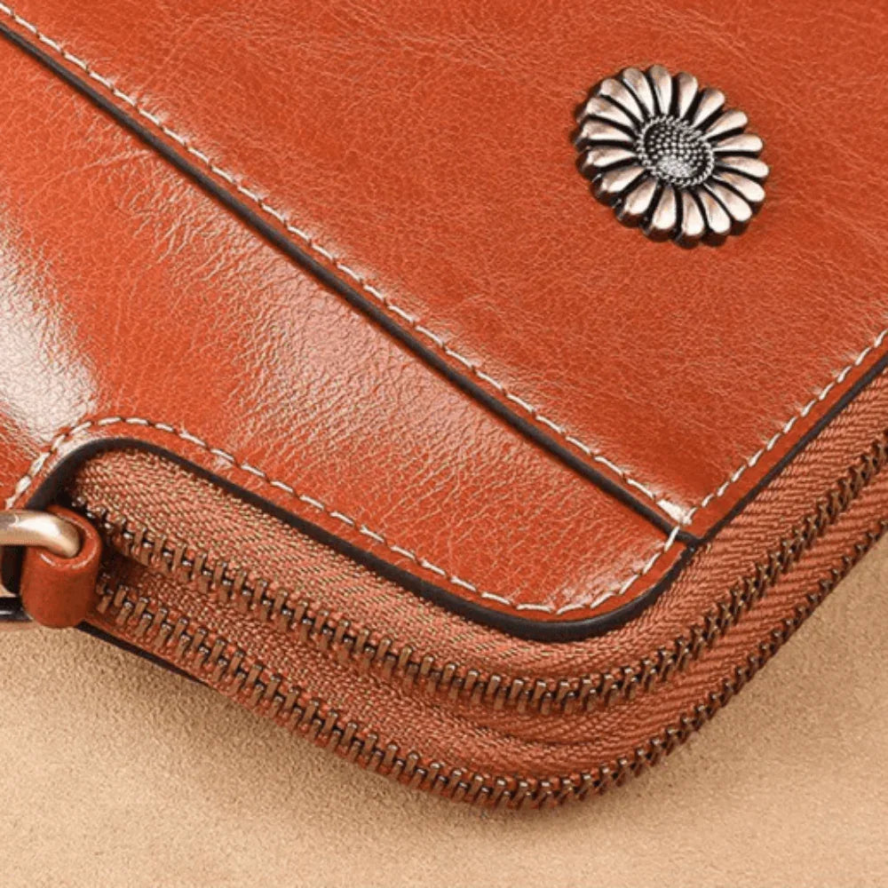 Eloria | Kompakt Crossbodytaske Med Blomsterdetalje