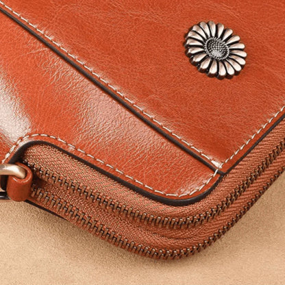 Eloria | Kompakt Crossbodytaske Med Blomsterdetalje