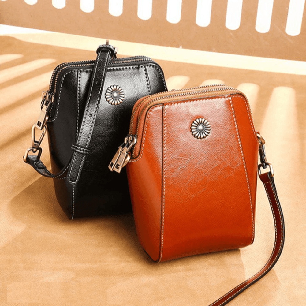 Eloria | Kompakt Crossbodytaske Med Blomsterdetalje