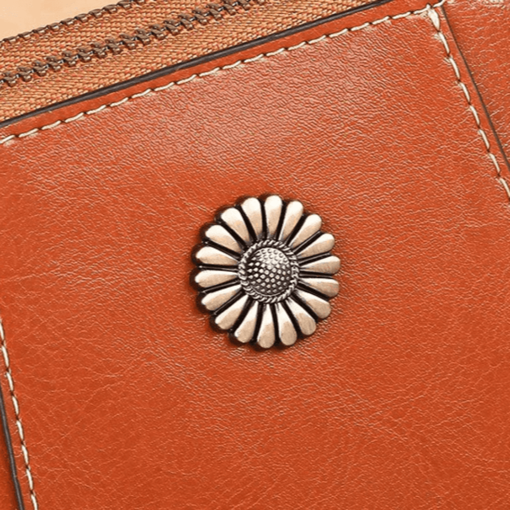 Eloria | Kompakt Crossbodytaske Med Blomsterdetalje