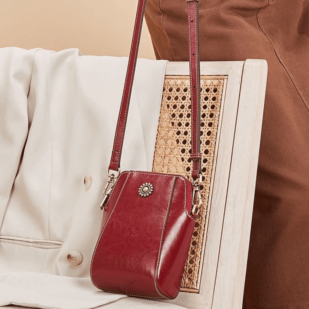 Eloria | Kompakt Crossbodytaske Med Blomsterdetalje