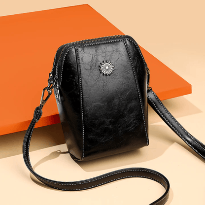 Eloria | Kompakt Crossbodytaske Med Blomsterdetalje