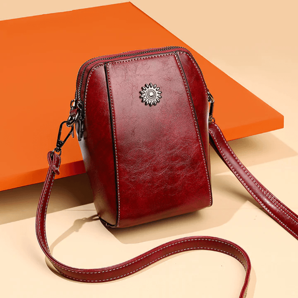 Eloria | Kompakt Crossbodytaske Med Blomsterdetalje