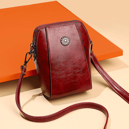 Eloria | Kompakt Crossbodytaske Med Blomsterdetalje