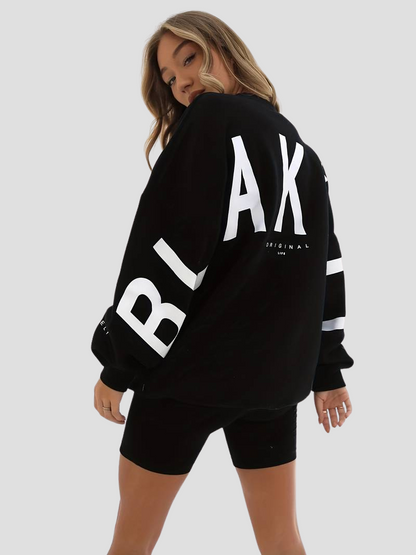 Ravaya™ | Damer Oversized Sort Sweater med Store Bogstaver | Komfortabel Streetwear Sweatshirt til Casual og Loungewear
