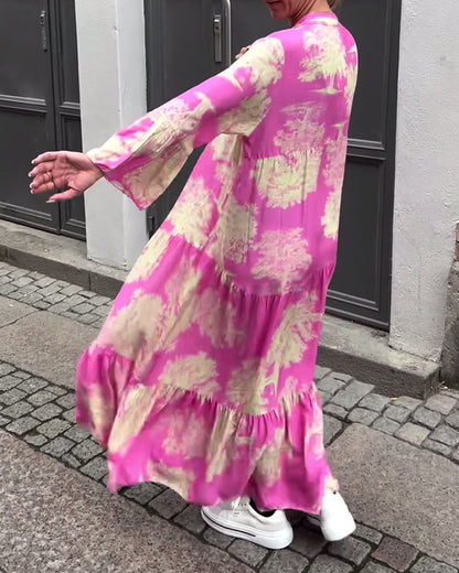 Eliana™ | Lang Kjole med V-hals, Klokkeærmer og Blomsterprint